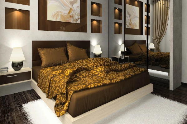 The luxurious Brown motif and the plush headboard of this bedroom take elegance to next level